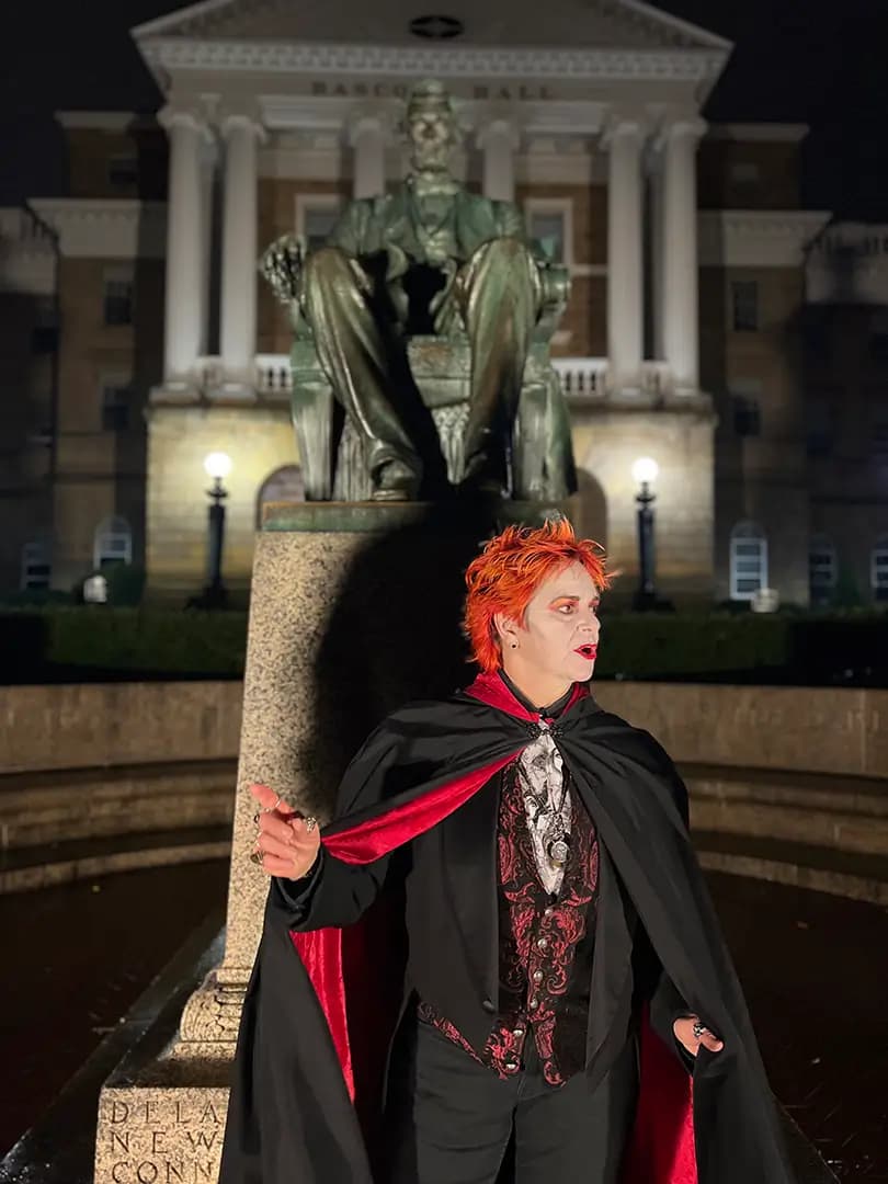 American Ghost Walks guide leading a lantern-lit walking tour