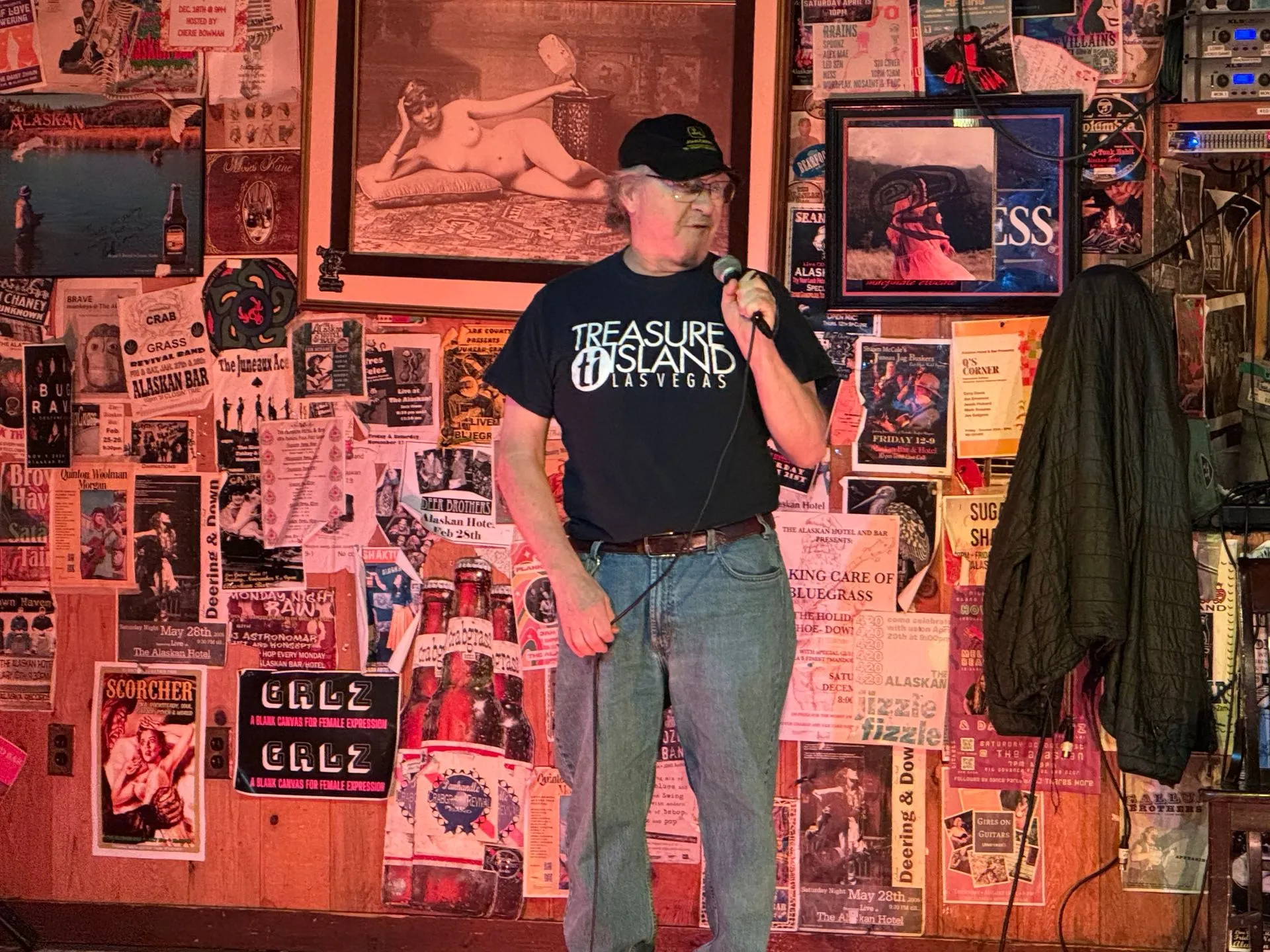 Steve singing karaoke at the Alaskan Hotel and Bar stage