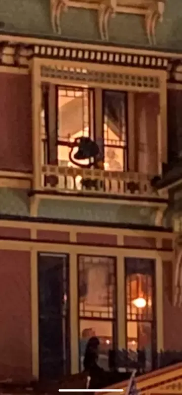 A building with a lot of windows and a balcony