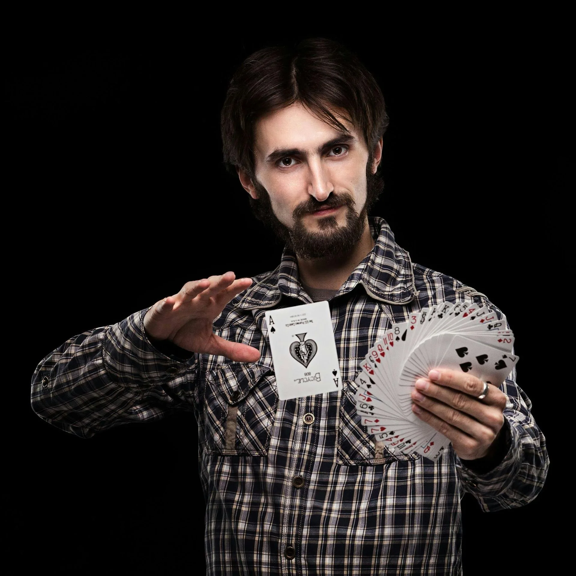 Magician with a deck of cards