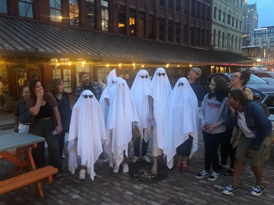 Bachelorette party dressed as ghosts in the Third Ward of Milwaukee